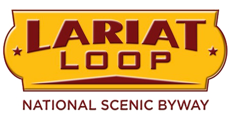 Yellow background logo with brick red lettering that says Lariat Loop, National Scenic Byway.