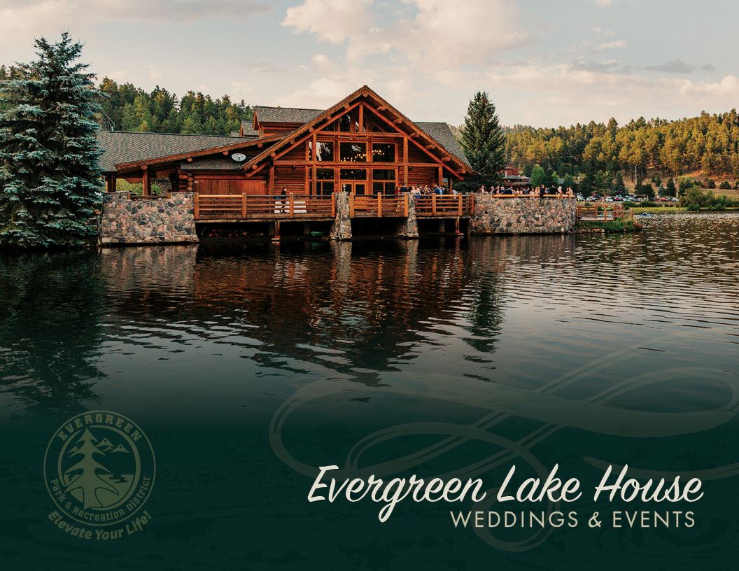 Evergreen Lake House reflecting on the water.