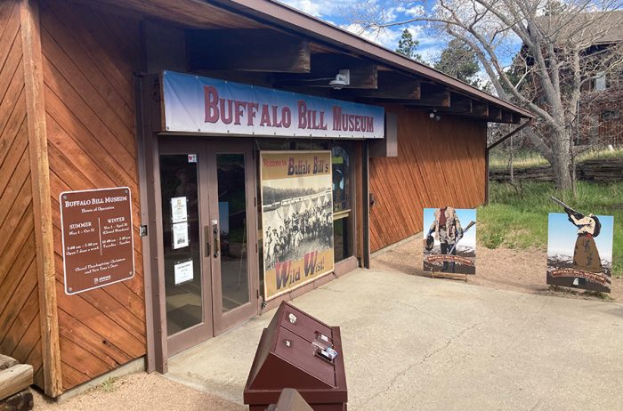 Exterior image of front doors of the Buffalo Bill Museum in Colorado.