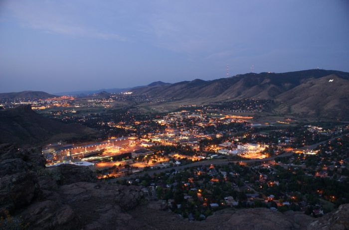 Evening view of city lights in the town of Golden, Colorado at dusk.